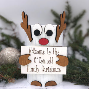 Welcome to our family Christmas unusual reindeer style sign