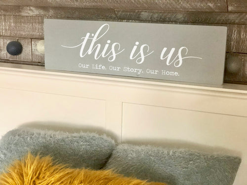 This is us quote grey painted large wooden freestanding sign with white writing